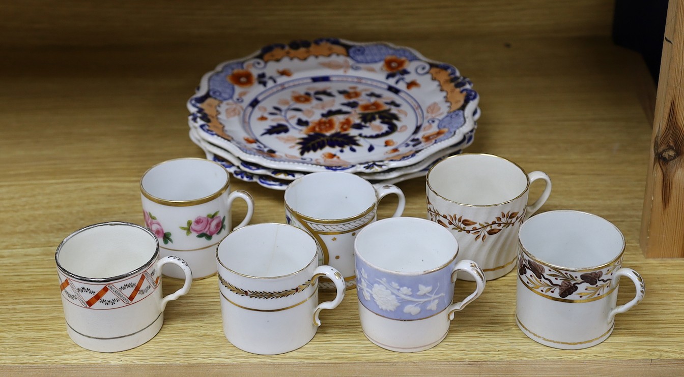 Seven early 19th century coffee cans and three Ridgway Imari style plates, plates 23 cms diameter